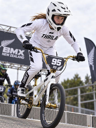 THRILA Flight White BMX racewear on a rider