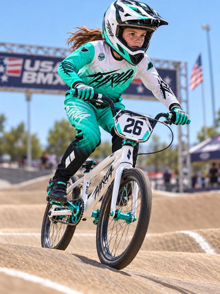 THRILA Vulcan Teal BMX racewear on a rider