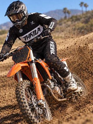 THRILA Thrash Motocross racewear on a rider