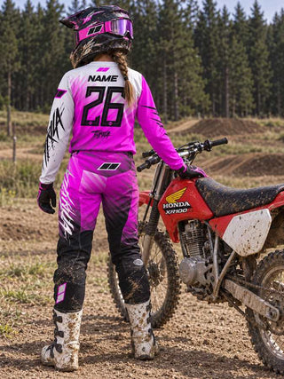THRILA Vulcan Pink Motocross racewear on a rider