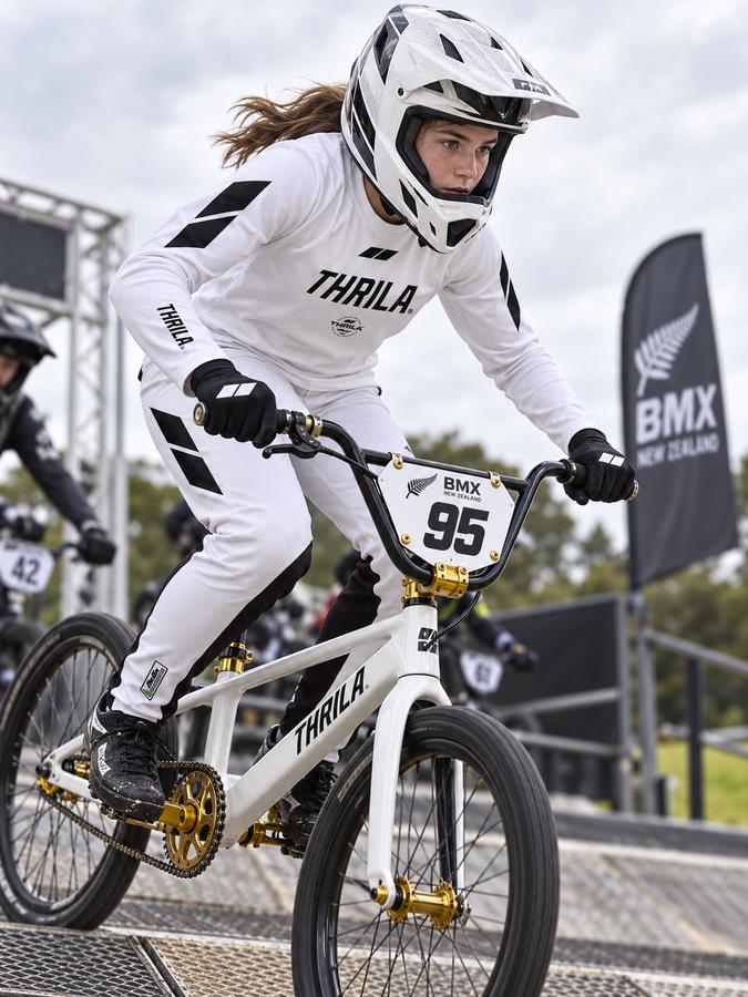 THRILA Flight White BMX racewear on a rider