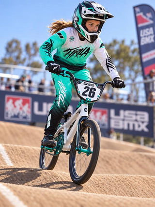 THRILA Vulcan Teal BMX racewear on a rider