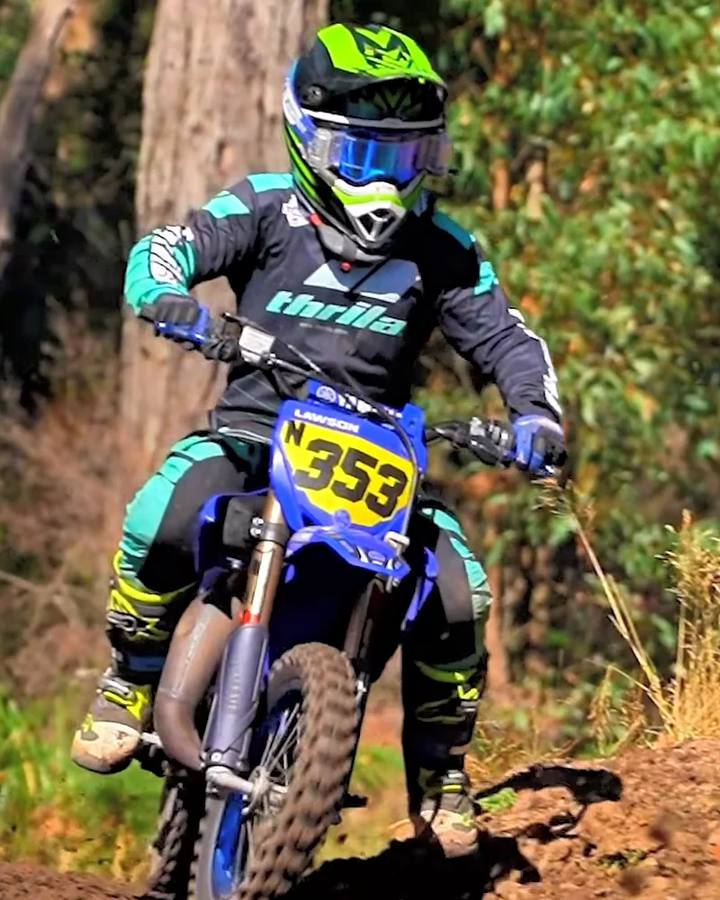 THRILA Cool Mint motocross racewear on a rider
