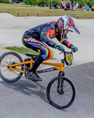 THRILA Candy Black BMX/MTN Bike racewear on a rider