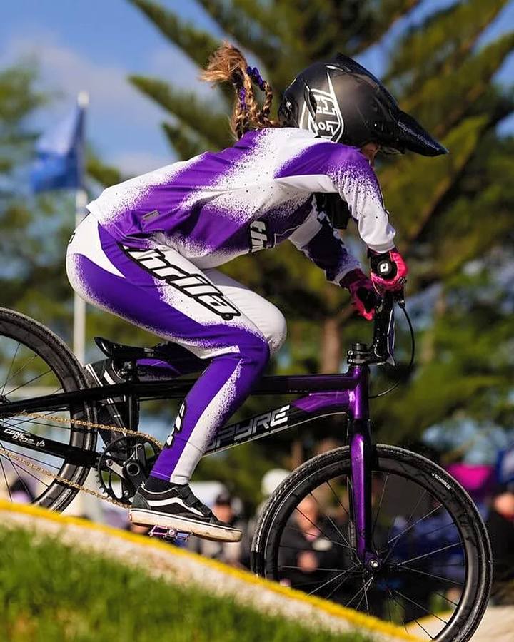 THRILA Conqueror Purple BMX/MTN Bike racewear on a rider
